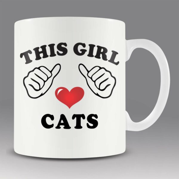 This girl loves cats mug