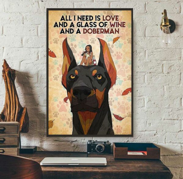 All I need is love and a glass of wine and a doberman poster